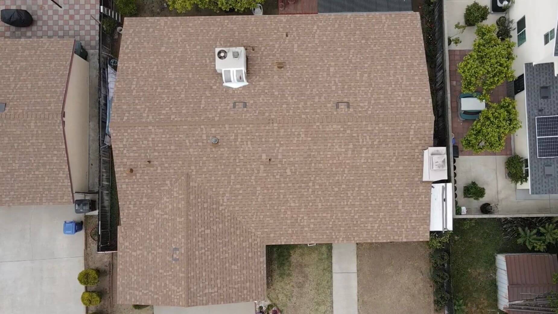 Brown asphalt shingle roof installation (after)